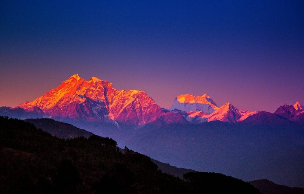 Scenic view of Himalayan peaks during the evening sunset in Uttarakhand.