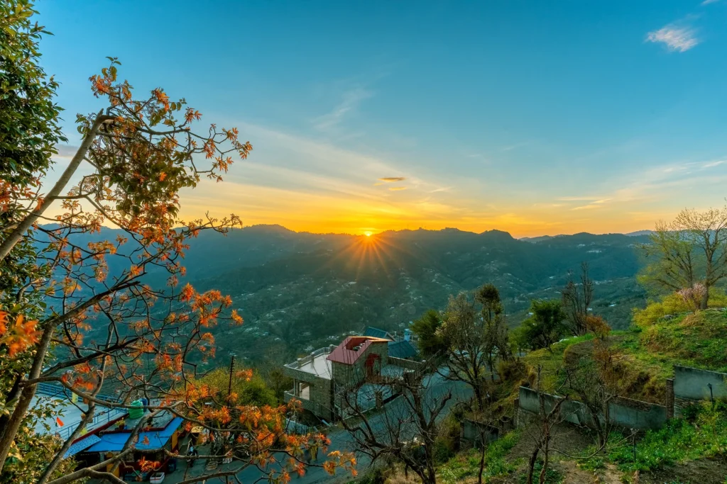 alt="Mukteshwar - serene Himalayan village with orchards, pine forests, and panoramic mountain views in Uttarakhand."