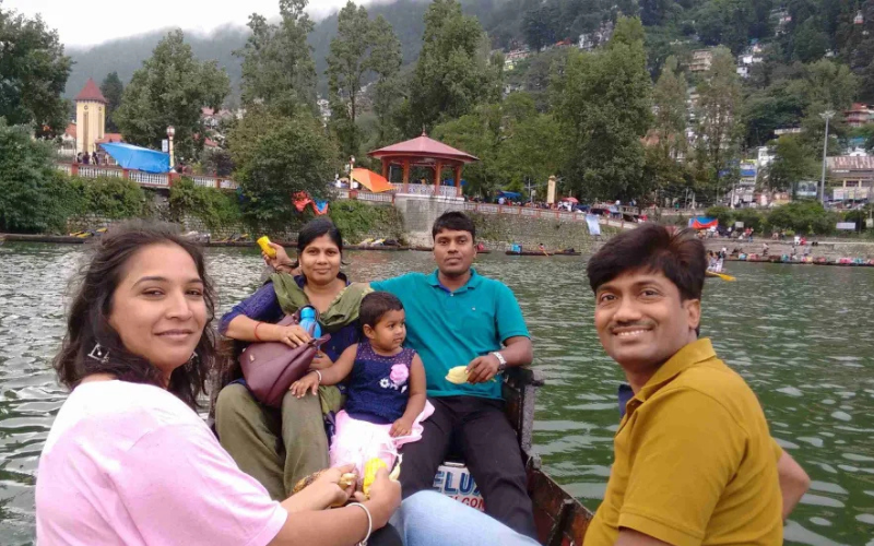 "Family enjoying boating at Naini Lake"